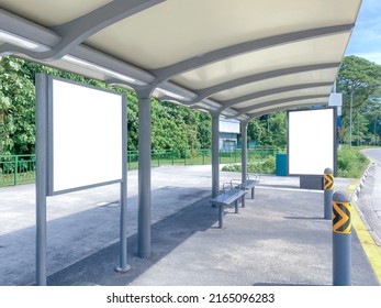 Blank Billboard Poster Advertisement Mockups At Empty Bus Stop Shelter By Main Road, Greenery Behind; Out-of-home OOH Vertical Billboard Media Display Space