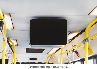 Blank Billboard in Public Subway. black TV without information inside the bus. Video advertising in public transport. Mock up electronic media board with copy space for your design information
