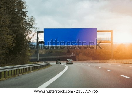Blank billboard or road sign template on the highway. Empty billboard mockup for advertising located on the motorway