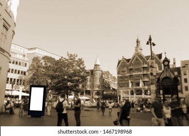 Blank Billboard Square Of The Crowd Or Outdoor Advertising Poster At Day Time For Advertisement. Yellow Background