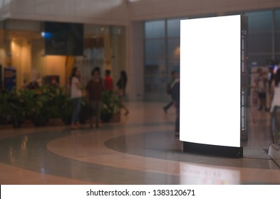 blank billboard white screen LED vertical advertising banner board indoor in subway station ad interior public hall.