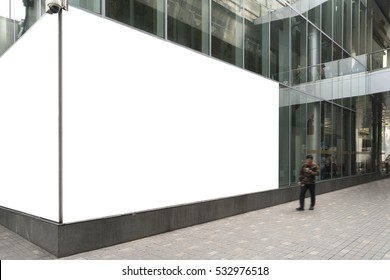 Blank billboards located on glass wall outside of shopping plaza, useful for your advertising.