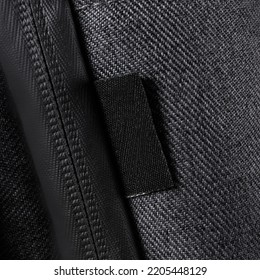 Blank Black Clothing Label On Black Color Fabric Texture