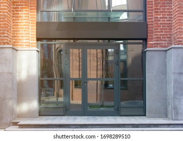 Blank Black Rectangular Box Store Entrance Mockup, Glass Brick Wall, Front View. Empty Company Or Restaurant Banner With Windows And Door Mock Up. Clear Boxed Frame For Boutique Mokcup Template.