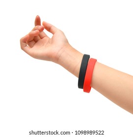 Blank Black, Red Rubber Wristband Mockup On Hand, Isolated. Sport Sweatband Template Wear On Wrist Arm. Silicone Fashion Round Social Bracelet Wear On Hand. Unity Band.