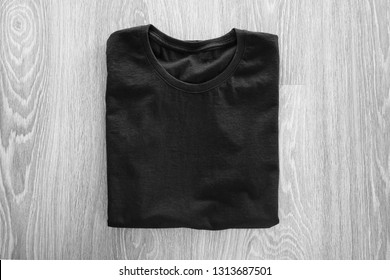 Blank Black Tshirt On Wooden Background Stock Photo 1313687501