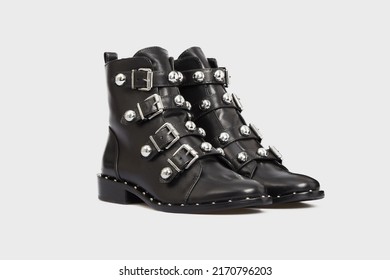 Blank black women's fashion cossack Cowboy boots isolated on white background. Female classic spring autumn shoes with pointy toe, metal rivets, spikes, buckle. Leather casual footwear