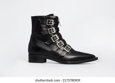 Blank black women's fashion cossack Cowboy boot isolated on white background. Female classic spring autumn shoe with pointy toe, straps, metal buckles. Leather casual footwear. Mock up, template