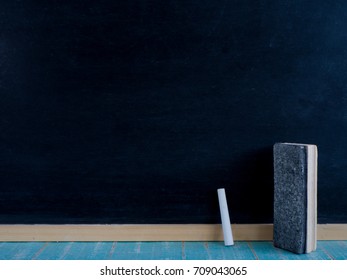 Blank blackboard chalks and eraser , texture for add text or graphic design.