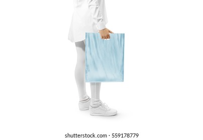 Blank Blue Plastic Bag Mockup Holding Hand. Woman Hold Plain Carrier Sac Mock Up. Polythene Bagful Branding Template. Shopping Carry Package In Persons Arm. Promo Packet For Logotype Branding