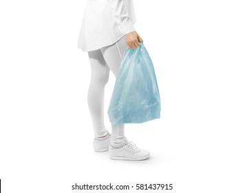 Blank Blue Plastic Bag Mockup Holding Hand. Woman Hold Coloured Carrier Sac Mock Up. Disposable Bagful Branding Template. Shopping Carry Package In Persons Arm. Promotional Packet For Logo Branding.