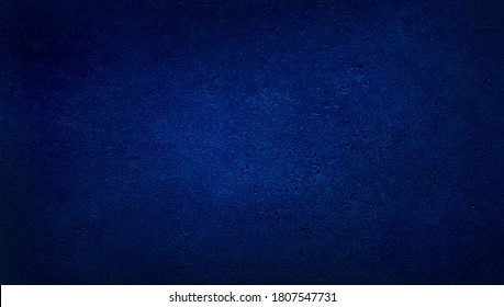 blank blue texture surface background and dark corners  blue grainy cement wall background and space for text 