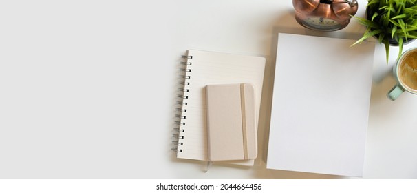 Blank book cover, diary, notepads, booklet and mock-up space for your text or product display with decorations on white background. Top view 