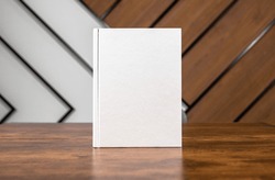 Blank Book Cover Mockup, Hardcover Mock Up Of Business Literature On Wood Desk, Office Table. High Quality Photo
