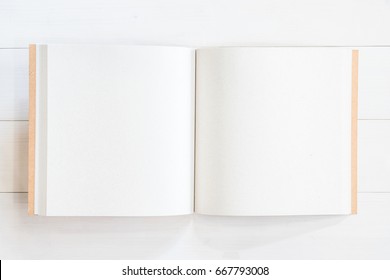 Blank Book Mock Up Template Square-size Recycle Paper Catalog Or Magazine With Open Pages On White Wood Table