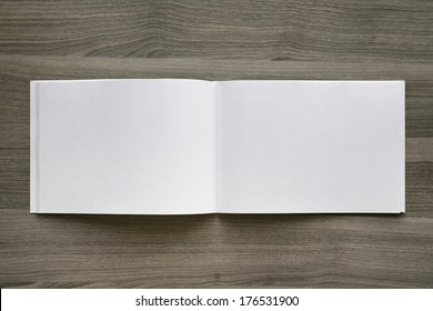 Blank. Booklet Isolated On Wooden Textural Background