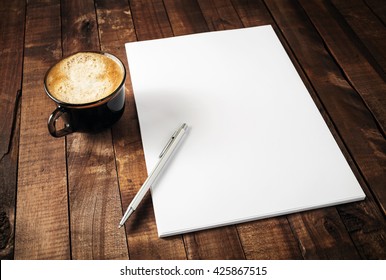 Blank Branding Template On Vintage Wooden Table Background. Letterhead, Coffee Cup And Pen. Photo Of Blank Stationery. Mock-up For Design Portfolios.