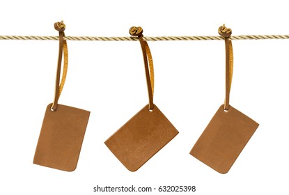 Blank Brown Leather Tag Hang On Rope Isolated On White Background