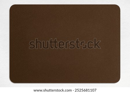 Blank brown rectangular card with rounded corners on a white background. The card is plain, simple, and brown, ideal for various design projects or templates. Dark brown paper card with round corners