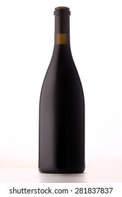 Blank Burgundy Style Red Wine Bottle With No Branding Or Label On White Background.