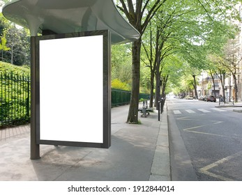 Blank Bus Stop Billboard Mockup In Empty Street In Paris. Parisian Style Hoarding Advertisement Close To A Park In Beautiful City