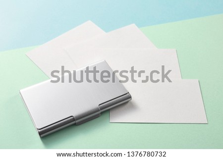 Blank business card on colorful background, business concept.