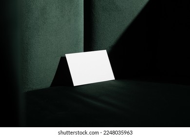 Blank business cards mockup template on a velvet, green art deco furniture, real photo. Isolated surface to place your design.  - Shutterstock ID 2248035963