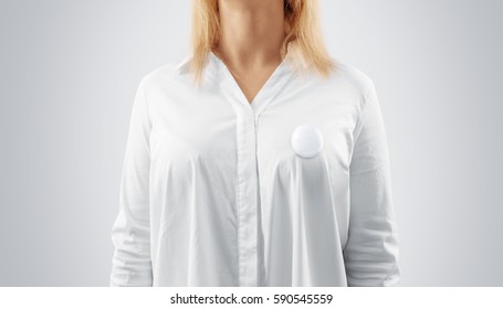 Blank Button Badge Mockup Pinned On The Womans Chest. Girl Wear White Shirt And Campaign Pin Mock Up. Volunteer Round Emblem Design Element. Pesron Stand Front View With Canvass Voting Symbol Template