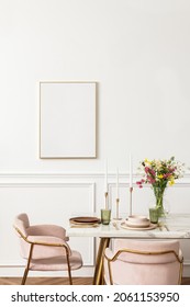 Blank canvas by a dining table in a modern boho chic aesthetic dining room