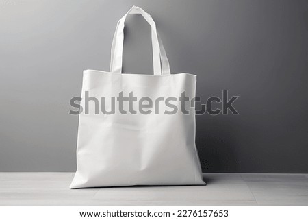 Blank canvas tote bag mockup in white eco friendly design with copy space. Concepts for zero waste movement of shopping bags.