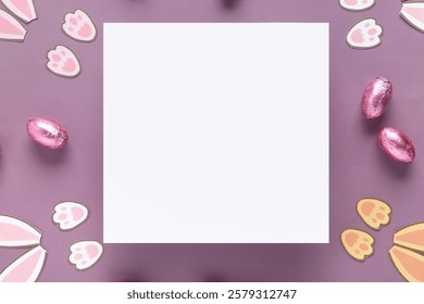 Blank card and Easter decor on purple background, closeup