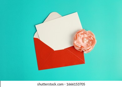 Blank card and envelope with handmade fabric flower on green background. Mother's day or valentine concept. - Powered by Shutterstock