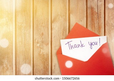Blank card and envelope with thank you on background