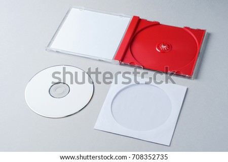 Blank CD on gray background. Mockup for branding