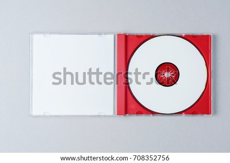 Blank CD on gray background. Mockup for branding