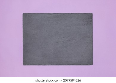 Blank Chalk Board On Purple. Empty Black Chalkboard. Copy Space. Abstract Mockup Background