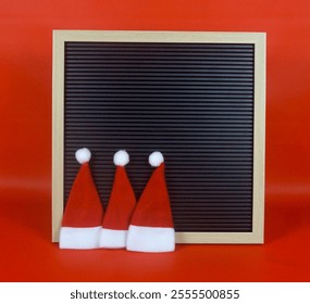 Blank Chalkboard with Three Santa Hat for Customizable Holiday Messages - Powered by Shutterstock