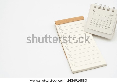 Blank Check list or Empty small notepad for text with checkbox and Simple desk calendar for NOVEMBER 2024. Blank to do list for text in NOV. Copy Space.
