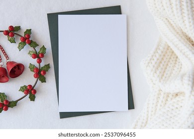 Blank Christmas Card with Holly Wreath and Knit Fabric for Festive and Winter Holiday Designs. Christmas mockup - Powered by Shutterstock