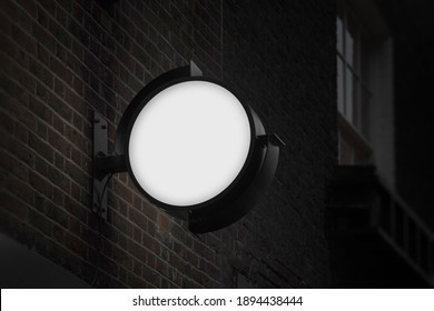 Blank Circle Sign Mockup In The Urban Environment, On The Facade, Empty Space To Display Your Store Sign Or Logo