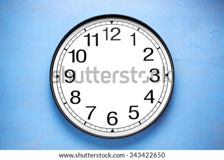Blank clock face on blue  background