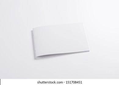 Blank Closed Horizontal Magazine Isolated On Grey Background With Soft Shadows