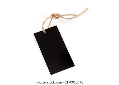 Blank Clothing Swing Tag In The Form Of Black Carton Sheet On A Rope On A White Background
