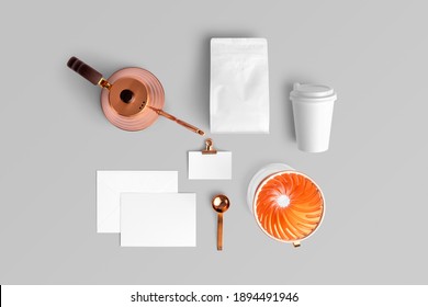 Blank coffee packaging, with the card, paper coffee cup, business card, copper pot, dripper, spoon, coffee packaging mockup with empty space to display your branding design.