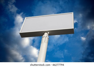 blank commercial billboard against cloudy sky