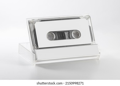 Blank compact cassette tape box label design mockup. Vintage cassete tape record case box mock up. Plastic analog magnetic tape cassette clear packaging template. Mixtape box cover