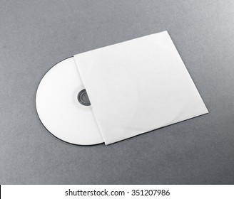 Blank Compact Disk On Gray Background. Mockup For Branding Identity For Designers.