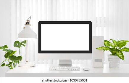 Blank computer screen copy space in modern white office environment