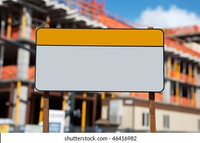 Blank Construction Sign Against Construction Site