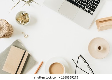 Blank copy space frame. Home office desk workspace with laptop on white background. Flat lay, top view girl boss work business hero header template.